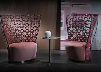 Fauteuil en métal avec assise en cuir